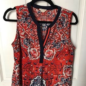 Vivid orange and navy blue sleeveless blouse